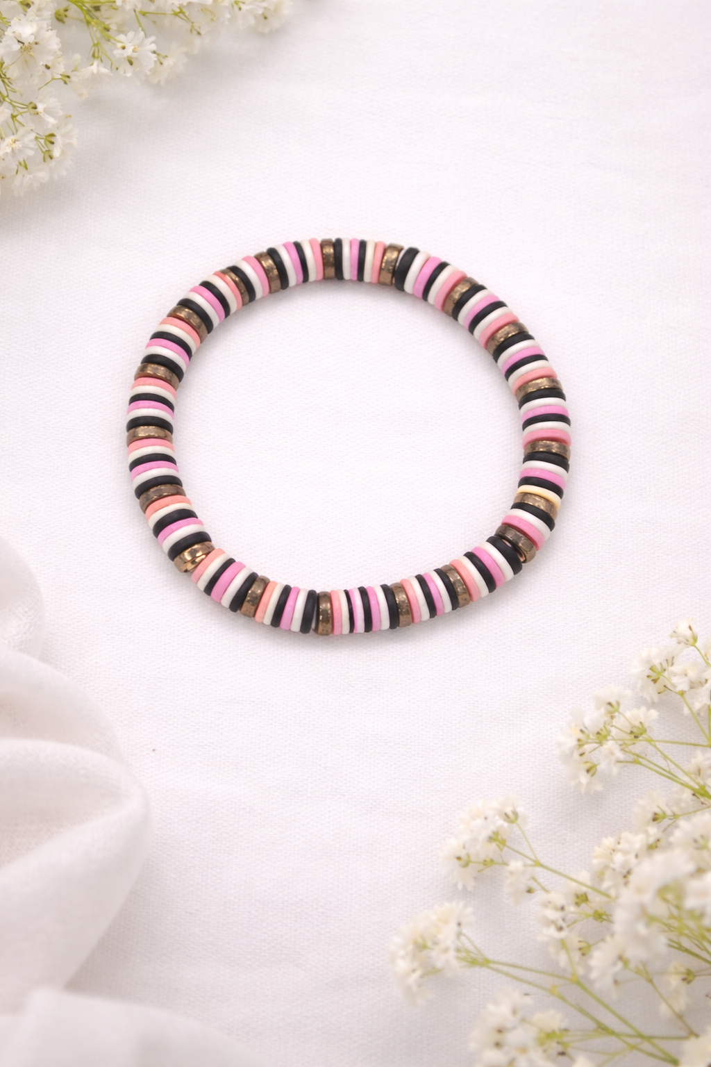 black pink and white clay bead bracelet